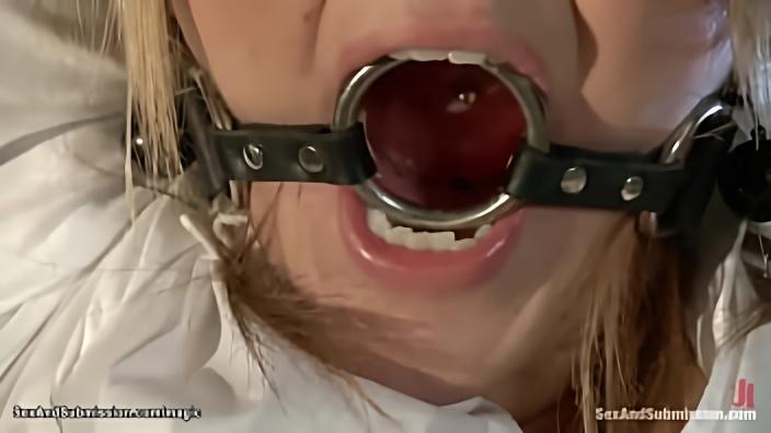 Suspended blonde fucked by big cock