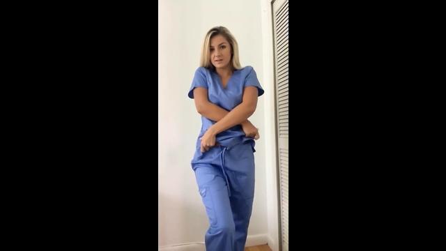 blonde nurse shows body